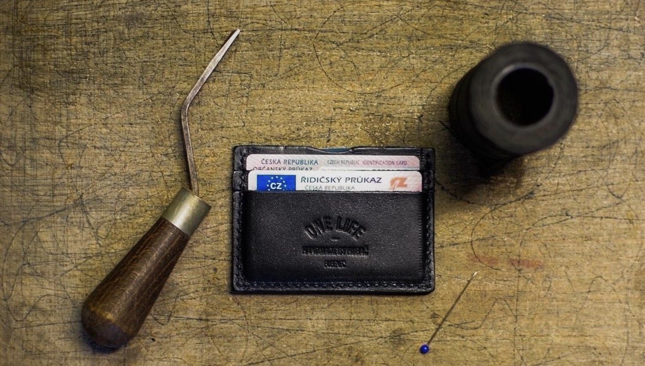 Black cardholder with debossed logo