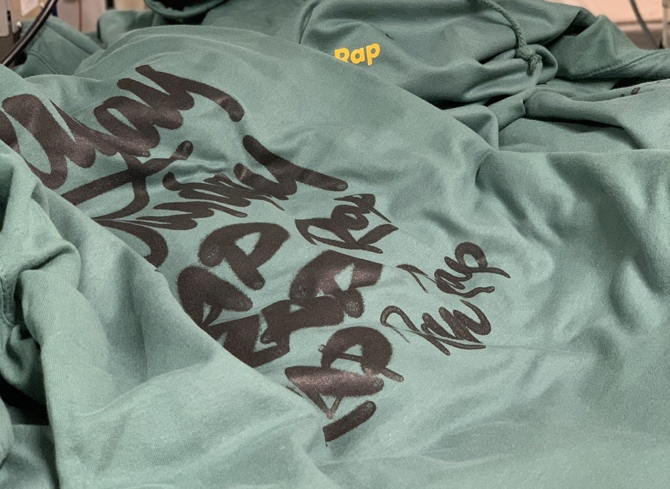 Hoodie with calligraphy across the back