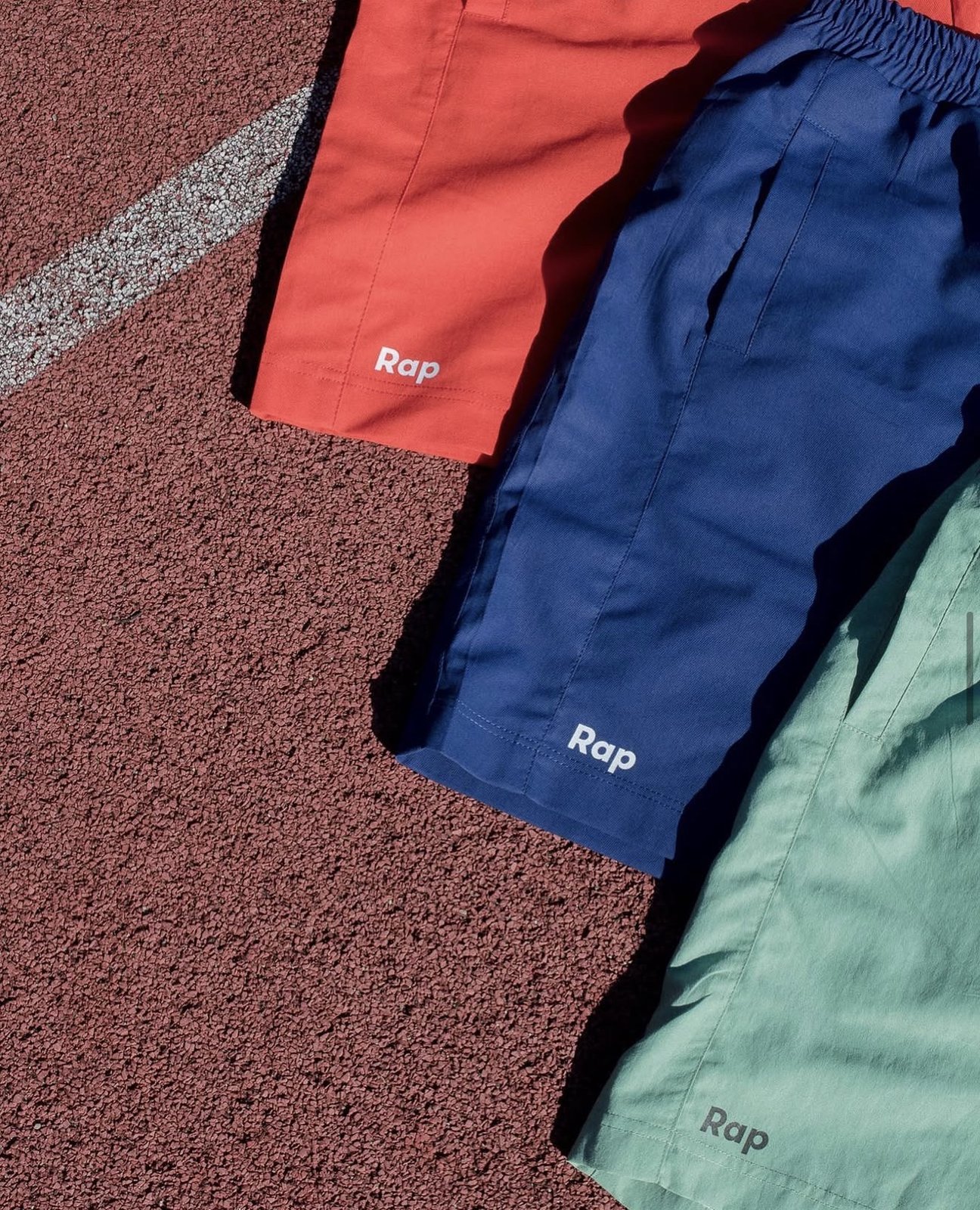 Custom-sewn shorts with a logo on the leg