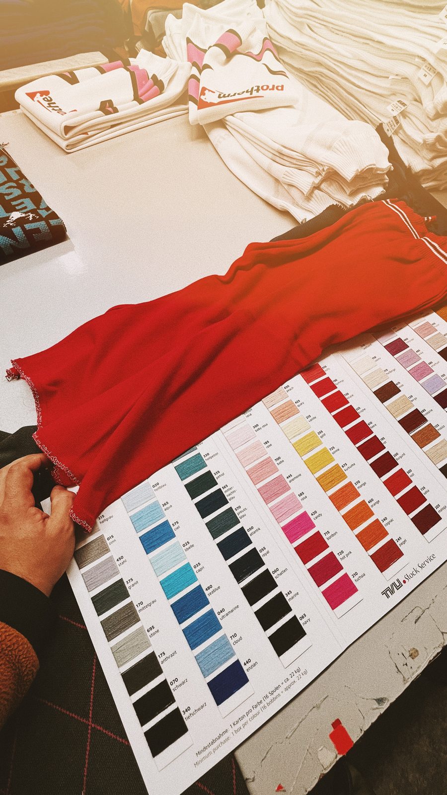 Choosing yarn colours from the swatch card