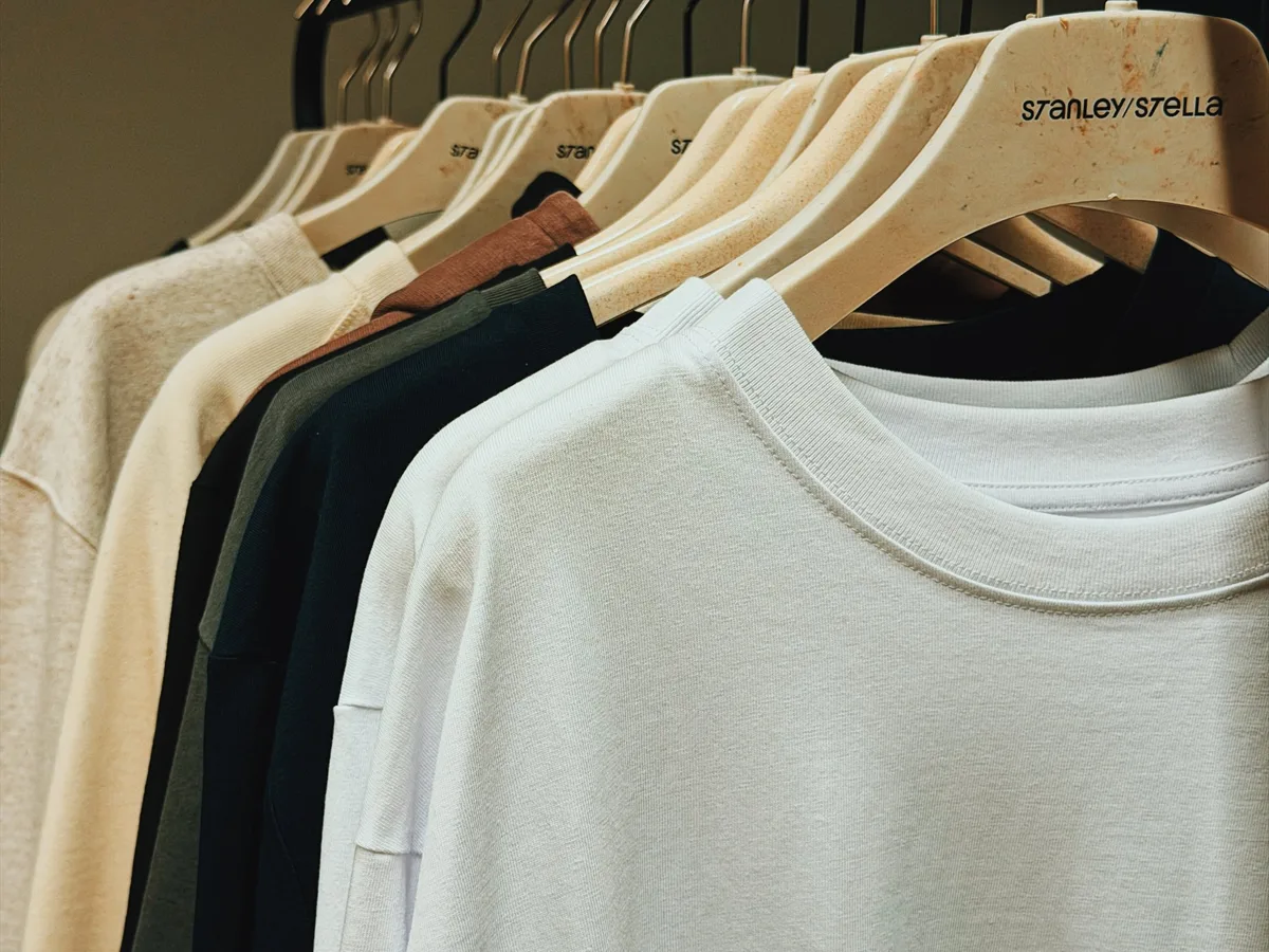 Stanley/Stella T-shirts on hangers in our showroom